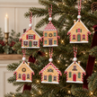 Hanging Gingerbread Houses – Set of Six styled in a warm neutral Christmas interior