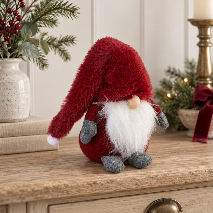 Deep Red Christmas Gonk styled in a warm neutral Christmas interior
