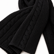 Close-up of the soft black cable knit scarf texture