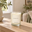 Heaven Scent Black Oud Small Candle unlit on an oak console
