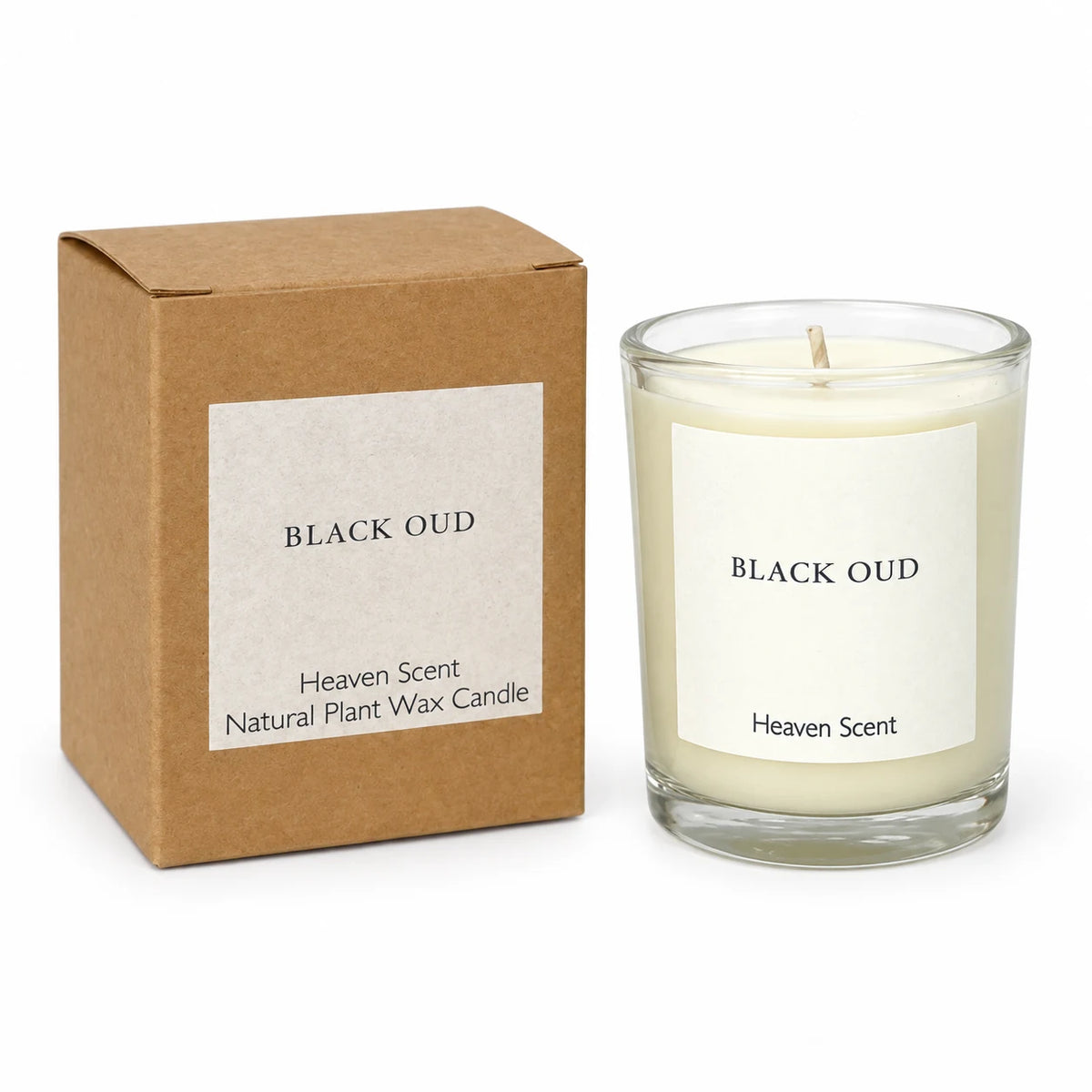 Heaven Scent Black Oud Small Candle unlit with its kraft box on white