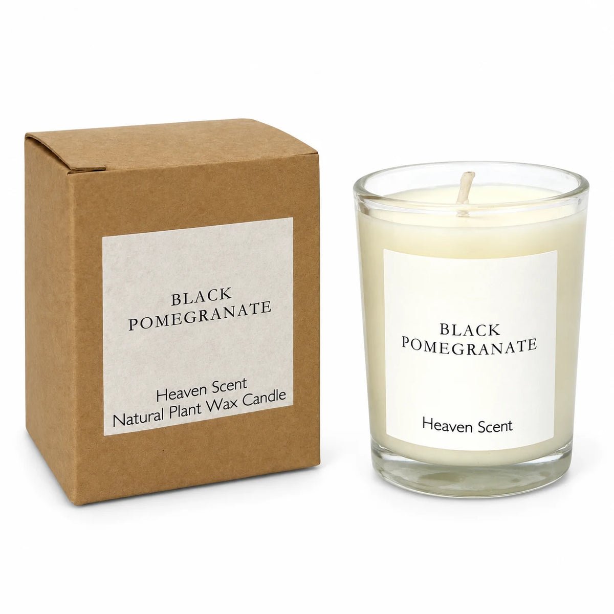 Heaven Scent Black Pomegranate Small Candle unlit with its kraft box on white