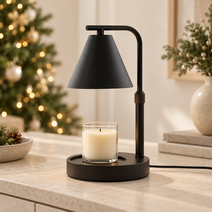 Black candle warmer lamp with an unlit jar candle in a neutral Christmas living room