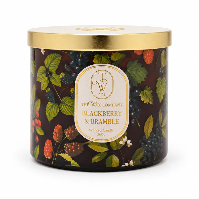Blackberry and Bramble botanical candle with gold lid, white studio view