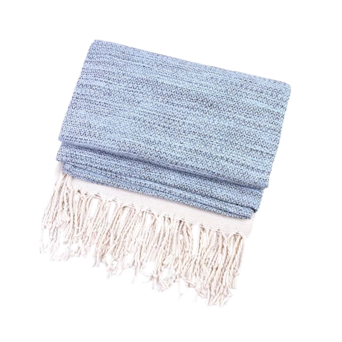 Blue and neutral diamond stitch hammam style throw blanket from Starlight Express, showcasing soft, woven textile with intricate pattern.