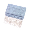 Blue and neutral diamond stitch hammam style throw blanket from Starlight Express, showcasing soft, woven textile with intricate pattern.