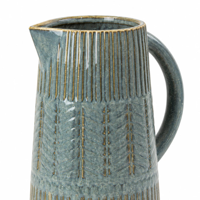 Large 32cm blue ceramic jug with mottled glaze and textured bands, detail view.