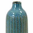 Large blue ceramic vase close-up of the glazed neck and textured ceramic body.