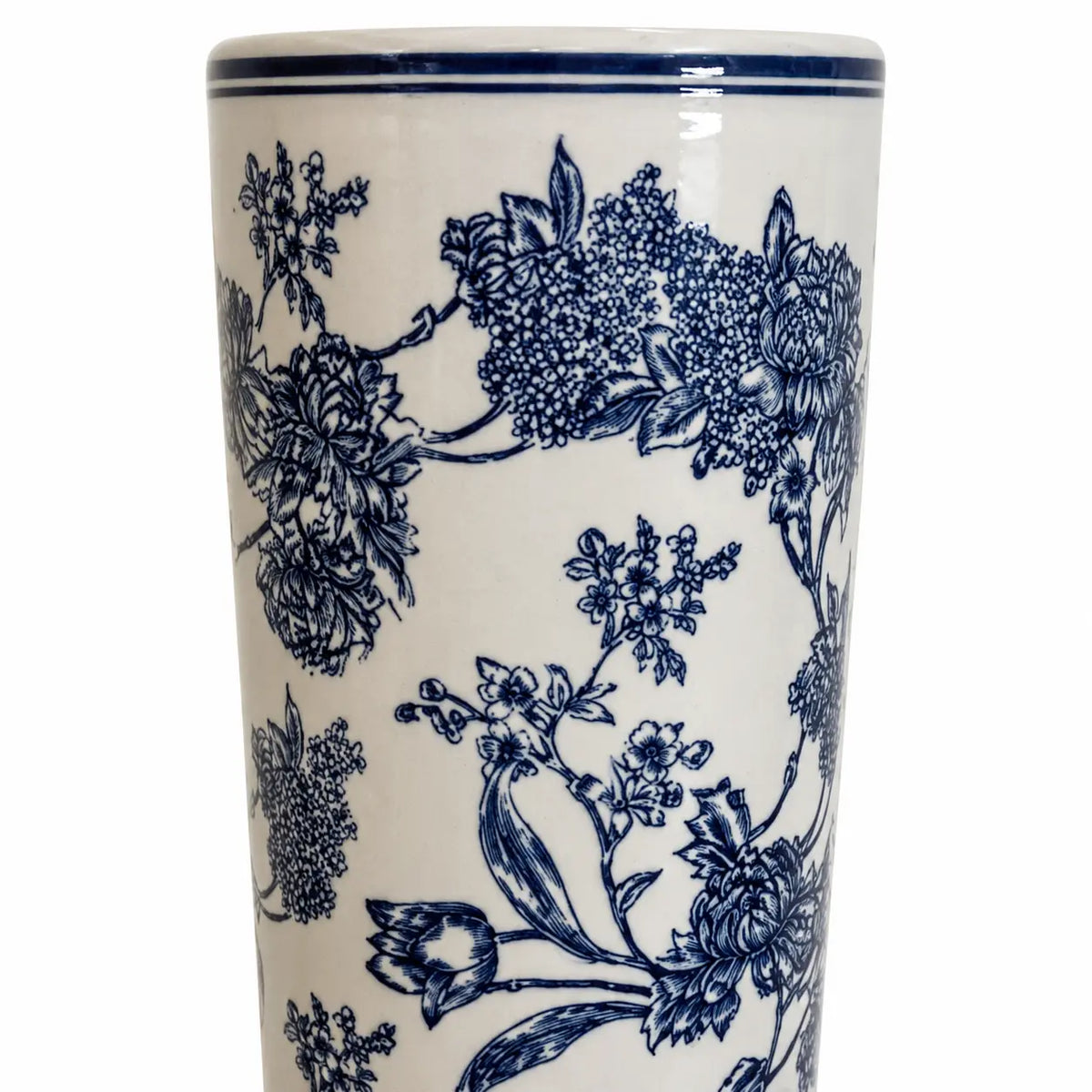 Close-up of navy floral decoration and double blue rim on the magnolia umbrella stand