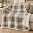 Riva Home Braemar check sherpa fleece throw in green and natural with soft sherpa reverse