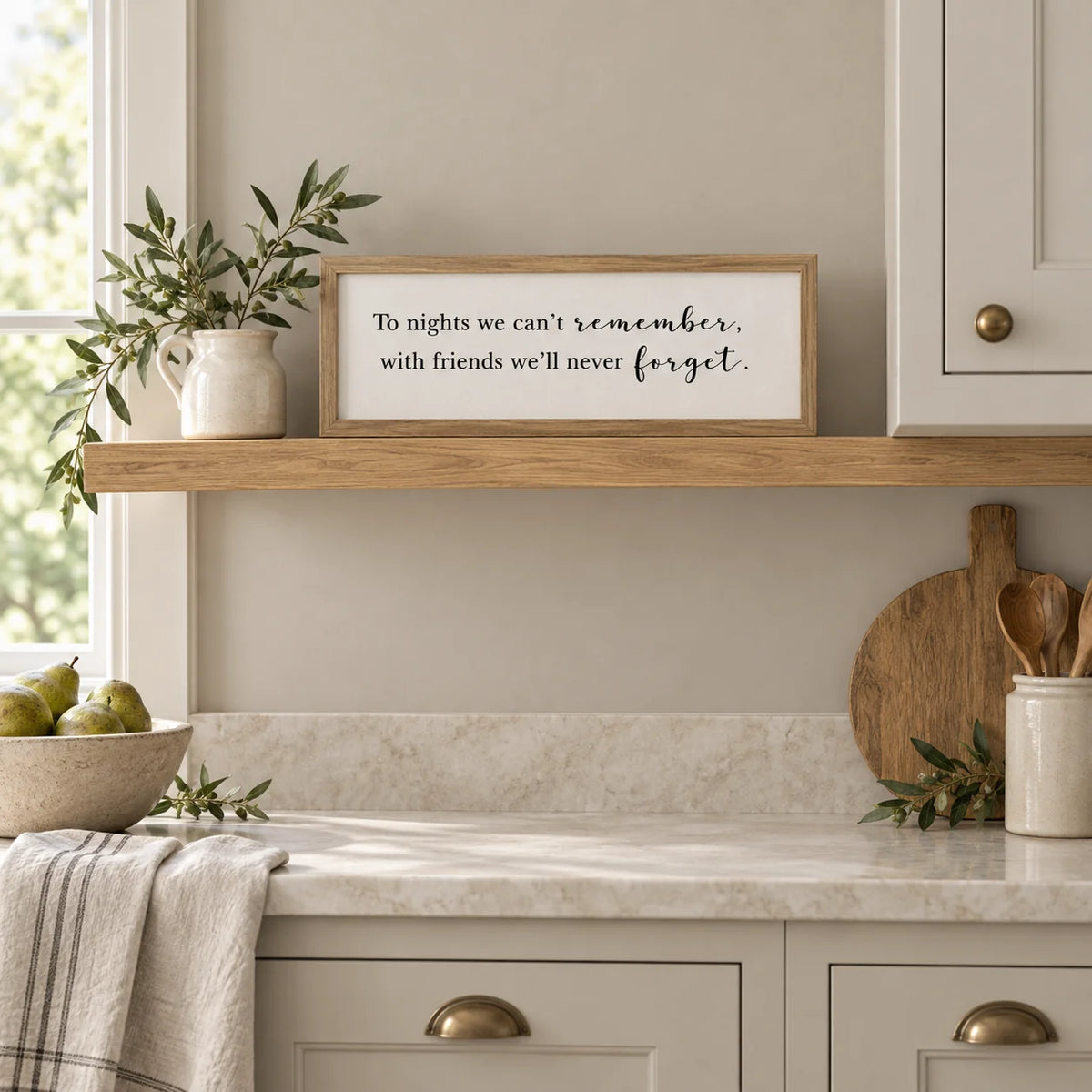 To Nights framed sign styled on an oak shelf in a classic modern country kitchen