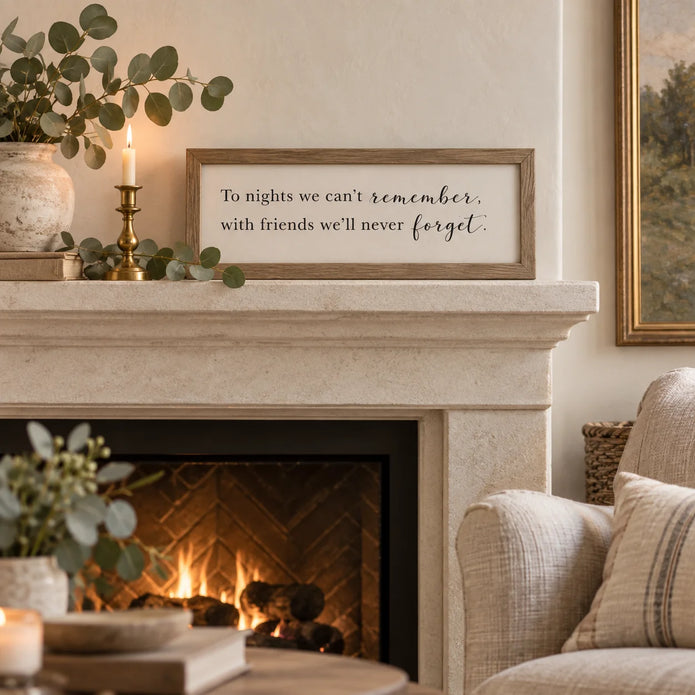 To Nights framed sign styled on a limestone mantel in a classic modern country living room