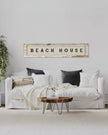 Large antique wood Dutch shutter framed canvas wall art by Brayden and Brooks, featuring a beach house scene for coastal decor.