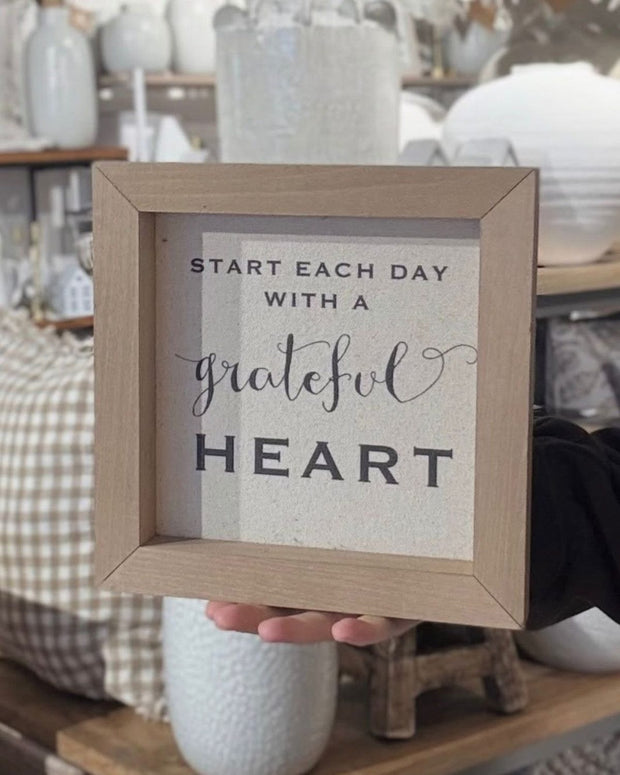 Rustic wooden framed wall art sign by Brayden and Brooks with the inspiring message "Start Each Day With A Grateful Heart."