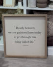 Rustic wooden wall art sign by Brayden and Brooks with “Dearly Beloved” in a large frame, featuring natural wood finish.