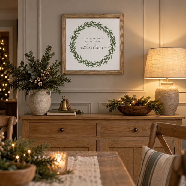 Have Yourself a Merry Little Christmas sign styled above an oak sideboard in a classic modern country dining room