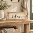 Brayden and Brooks Relax medium rustic oak sign, approximately 41 x 18 cm styled at true scale in a classic modern country interior, view 4.