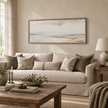 Brayden and Brooks extra large Seagrass framed canvas styled above an oatmeal linen sofa in a classic modern country living room.