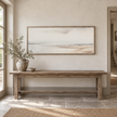 Brayden and Brooks extra large Seagrass framed canvas styled above an aged oak bench in a classic modern country hallway.