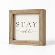 Brayden and Brooks Stay Awhile small rustic oak sign, 20 x 20 cm, angled studio view on white.