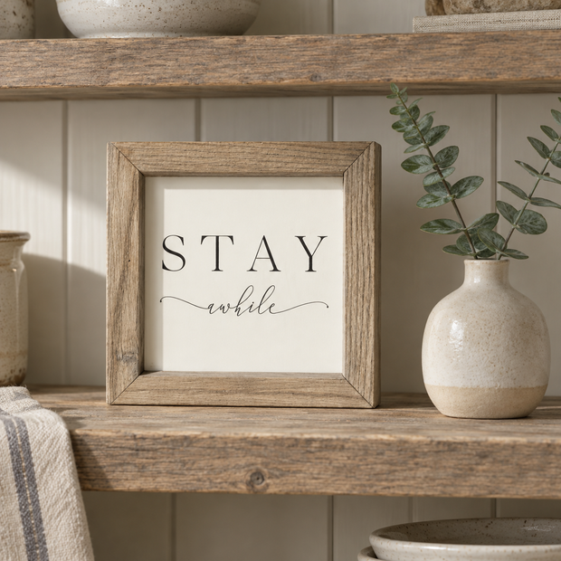Brayden and Brooks Stay Awhile small rustic oak sign, 20 x 20 cm, styled at true scale in a classic modern country interior, view 1.