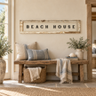 Brayden and Brooks Beach House antique shutter wall art styled above an oak bench