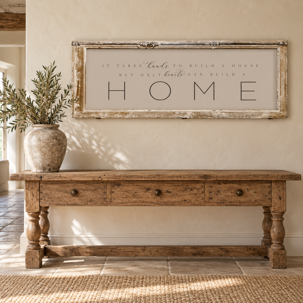 Brayden and Brooks HOME antique shutter wall art styled above an oak console