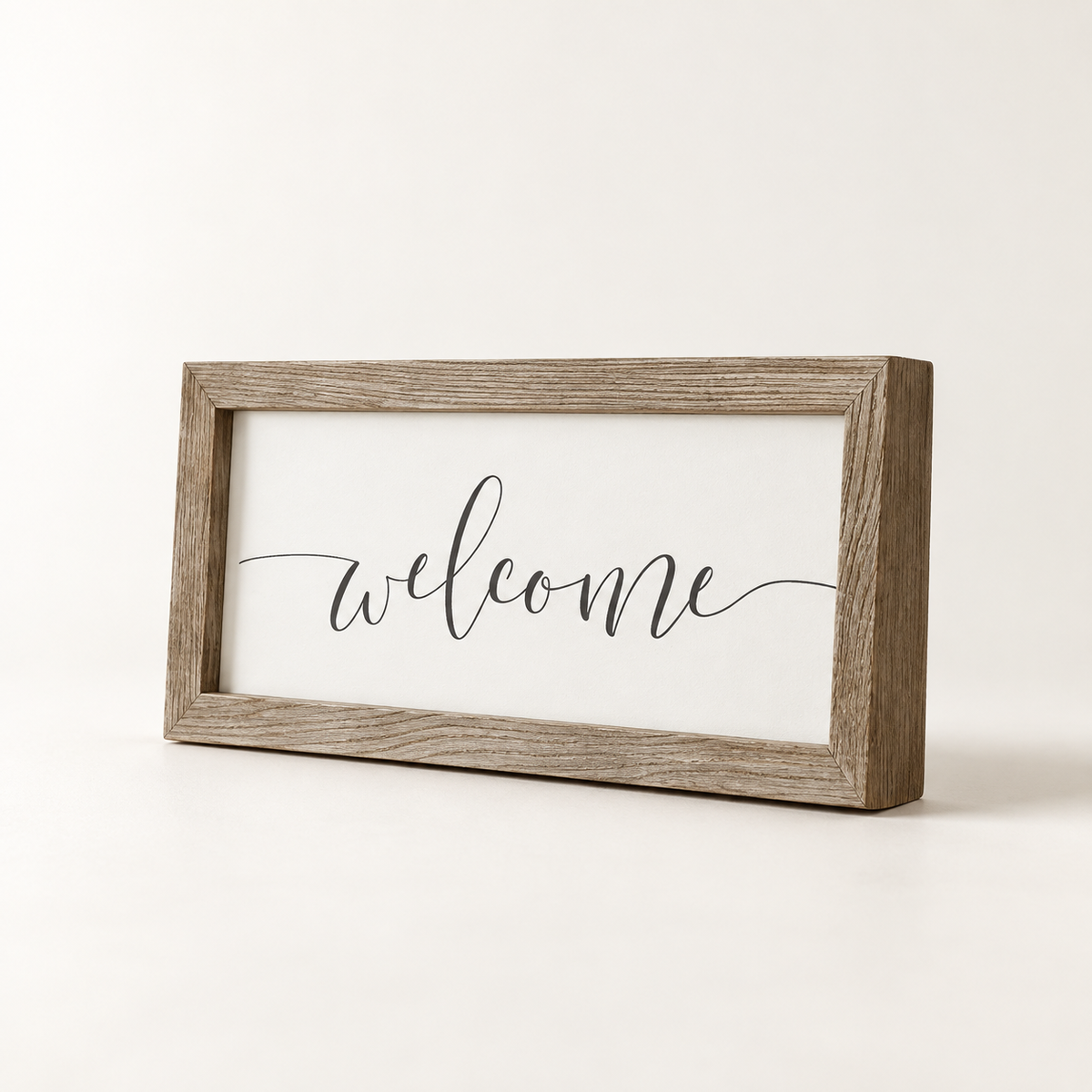 Brayden and Brooks Welcome medium rustic oak sign, approximately 41 x 18 cm, angled studio view on white.