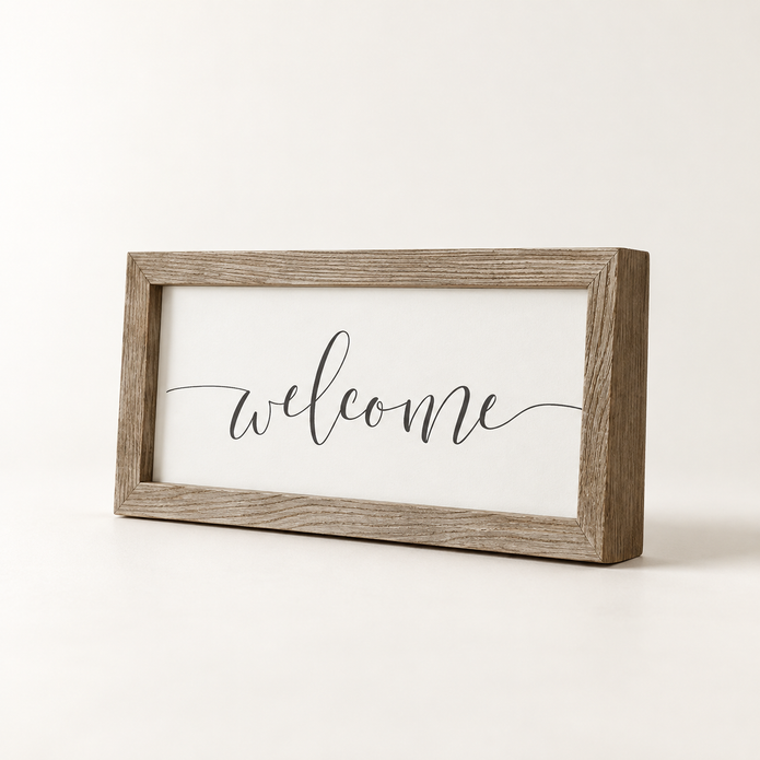 Brayden and Brooks Welcome medium rustic oak sign, approximately 41 x 18 cm, angled studio view on white.