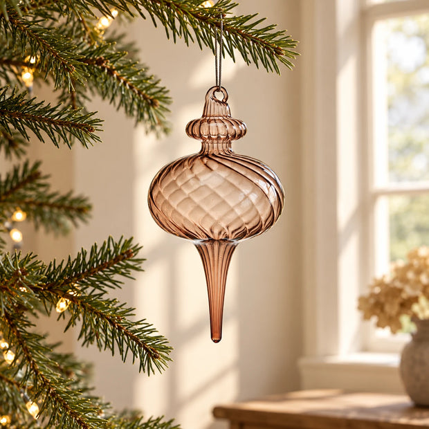 Brown Glass Teardrop Christmas Bauble — shorter finial hanging near window on fir branch