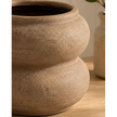 Brown Textured Sculptured Vase, close-up of the brown vase's textured curved body