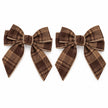Set of two small chocolate brown and tan checked tweed bows on white background