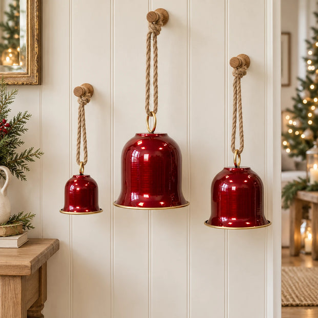 Set of three burgundy Christmas bells with hangers by Satchville, decorative holiday ornaments for festive decorating.