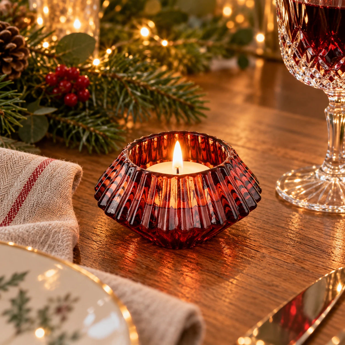 Ancient Wisdom burgundy diamond-shaped dinner candle and tealight holder for Christmas decoration, with a festive holiday design.