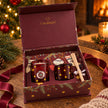 Burgundy Christmas diffuser and candle gift set with decorative baubles in a gift box, by Candlelight Products Ltd.