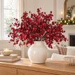 Multiple 40cm burgundy gypsophila stems in a full ivory vase arrangement.