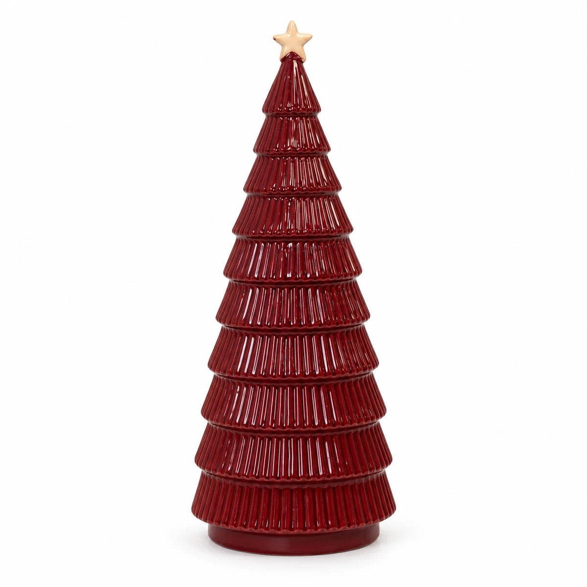 Large burgundy ribbed ceramic Christmas tree with cream star on white studio background