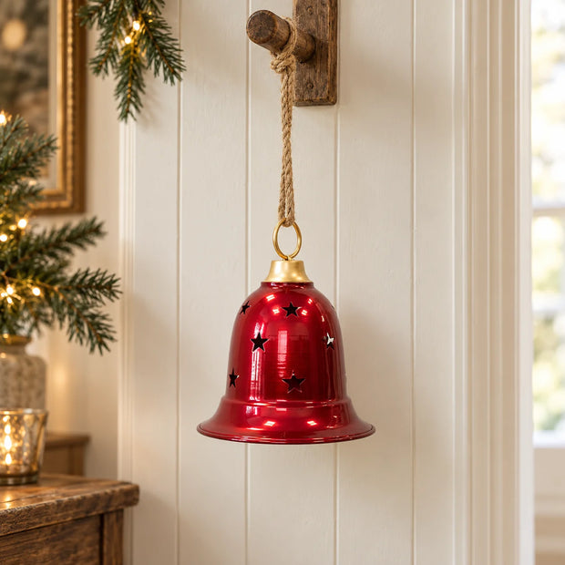 Burgundy metal cowbell on hanger, festive Christmas decor by Satchville, with rustic country style and decorative hanger.