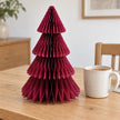 Burgundy paper Christmas tree beside a mug of tea, showing its 36cm height.