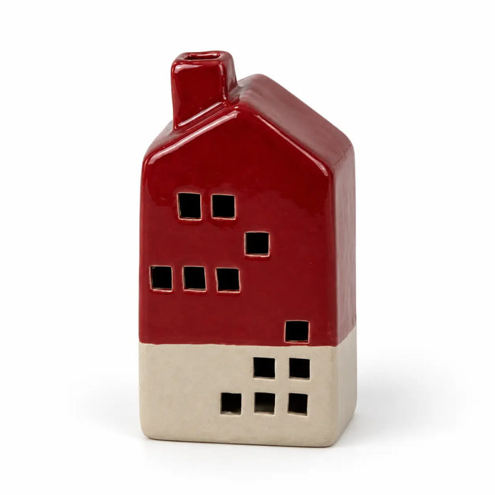 Burgundy red and cream ceramic LED house, unlit full studio view on white.