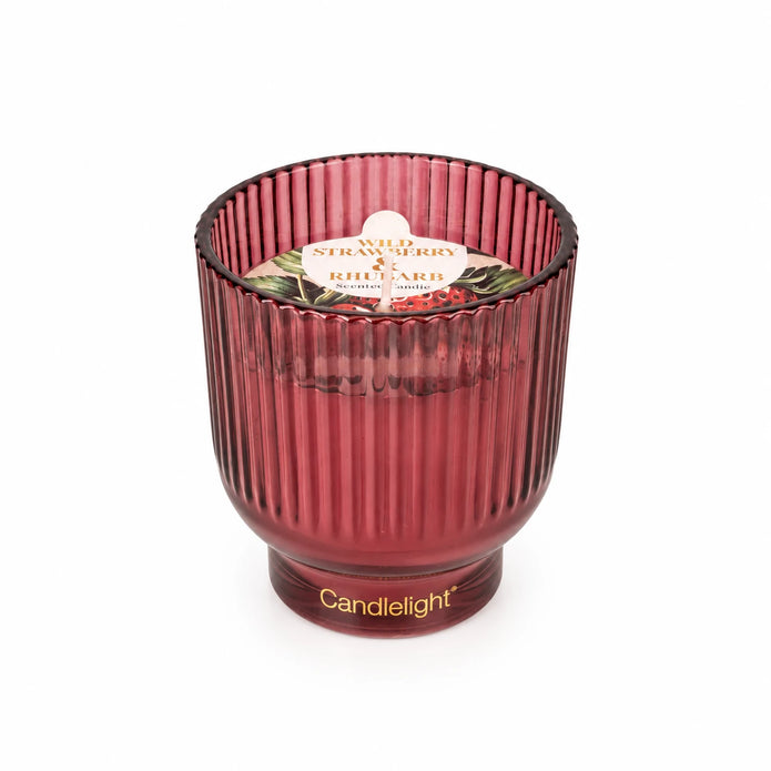 Burgundy medium ridged footed glass candle for Christmas by Candlelight Products Ltd in a white studio setting.