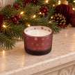 Burgundy red Christmas stockings and baubles candle on a mantel, festive holiday decor by Candlelight Products Ltd