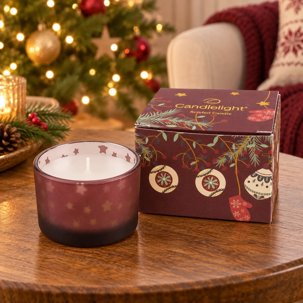 Burgundy red Christmas stockings and baubles candle on a table, festive holiday decor from Candlelight Products Ltd.