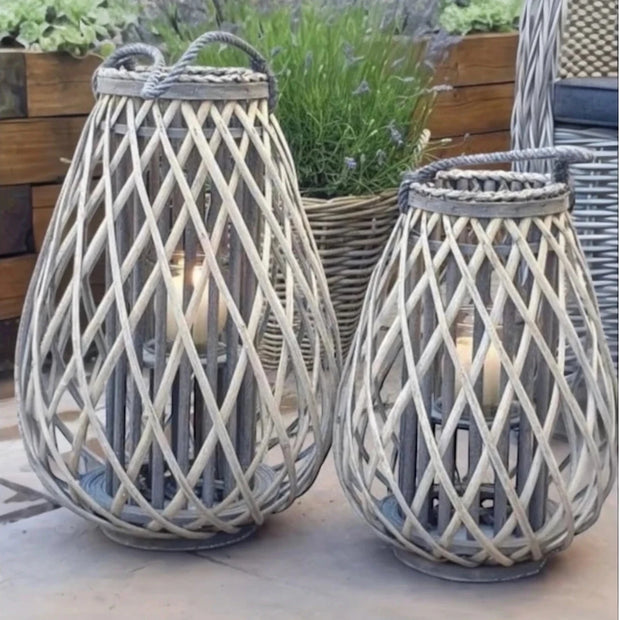 Natural rattan wicker bulbous garden candle lantern for outdoor home decor, by Hill Interiors.
