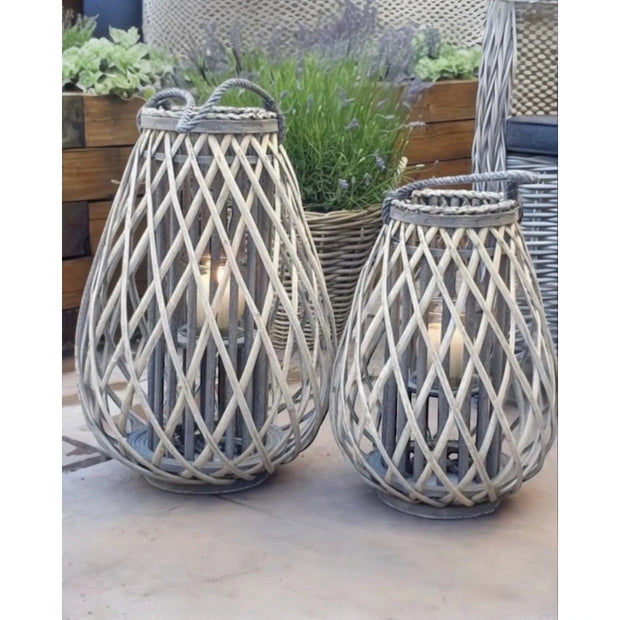 Natural rattan wicker bulbous garden candle lantern for outdoor home decor, by Hill Interiors.