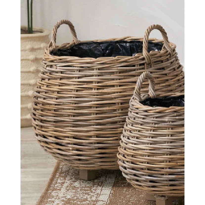 Round Burley Rattan Lined Bulbous Planter Basket for home decor by Pacific Lifestyle Ltd, showcasing its woven natural rattan design.