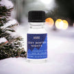 Ancient Wisdom Cosy Winter Nights Christmas fragrance oil 10ml bottle with festive holiday-themed packaging.