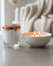 White scented candle in a sand jar with diamond dust, home fragrance by The Candledust, showcasing the elegant candle design.