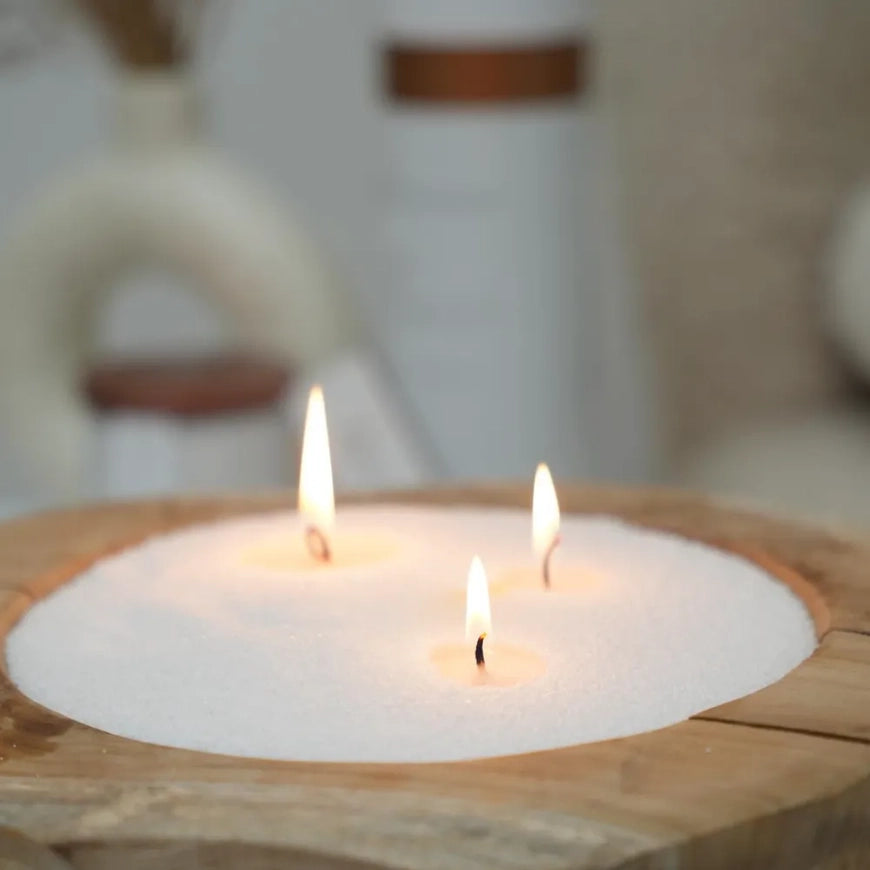 White scented candle sand kit from The Candledust Nordic Lights home fragrance collection, featuring a cozy candle setup.