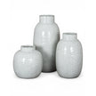 White glazed Cairn Dimple vase by Hill Interiors, featuring a rounded shape with textured dimples, perfect for home decor.